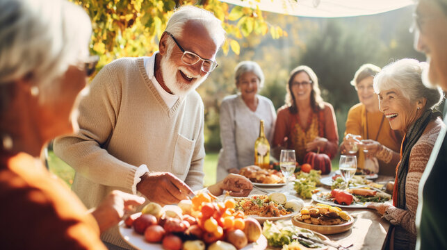 Seniors Enjoying a Harvest-Themed Potluck Picnic, Sharing Delicious Food and Laughter, happy seniors celebrating Thanksgiving, wide banner with copy space area Generative AI