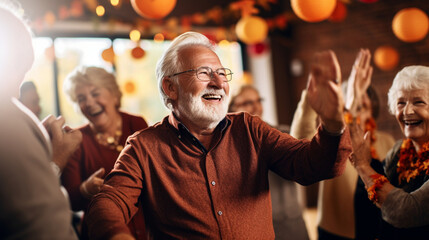 Obraz premium Senior Group Hosting a Thanksgiving Dance Party, Enjoying the Festive Atmosphere, happy seniors celebrating Thanksgiving, wide banner with copy space area Generative AI