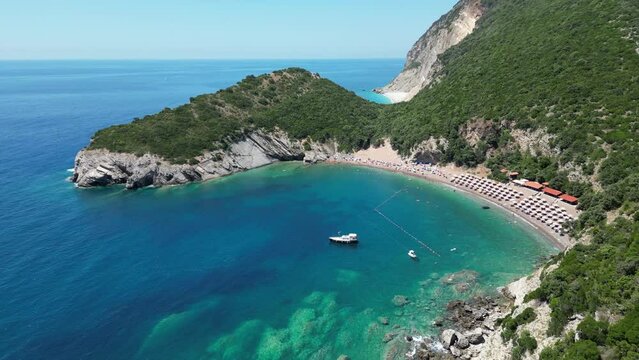 Queen's Beach ( Kraljichina Beach ) in Canj, Montenegro. Aerial view of paradise tropical beach, surrounded by green hills. Montenegro. Balkans. Europe.