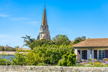 Bell tower of Notre-Dame-de-l'Assomption church in Sainte-Marie-de-Ré, France - obrazy, fototapety, plakaty