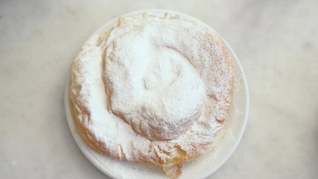 Spanish traditional food ensaimada in Cafeteria