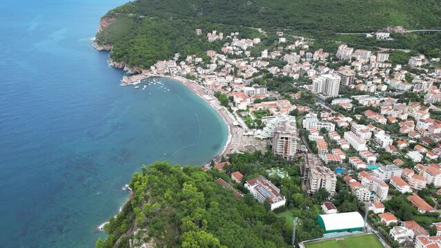 Petrovac na Moru Aerial View. Beaches and coastline of the Adriatic Sea at summer time. Natural landscapes of Montenegro. Balkans. Europe.	
