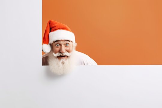 Holiday Surprise: An Old Man In A Santa Hat Peeks Out From Behind A White Wall And An Orange And White Background.