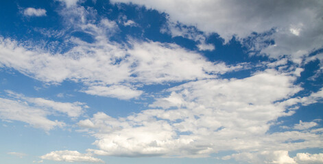 White clouds in the blue summer sky