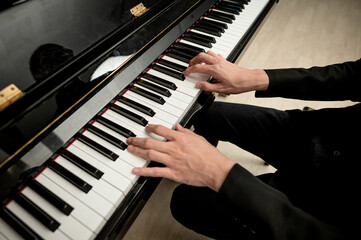 Pianist musician hands playing classical piano music instrument learning practicing jazz harmony...