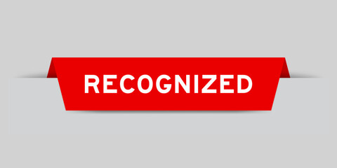 Red color inserted label with word recognized on gray background