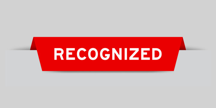 Red color inserted label with word recognized on gray background