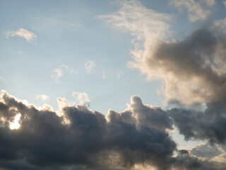 Fototapeta na wymiar Stormy sky with white and grey clouds background, beautiful sunset heaven photo