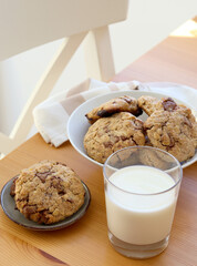 Oat and chocolate cookies with milk