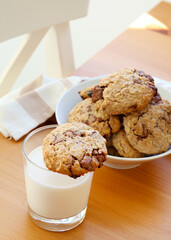 Oat and chocolate cookies with milk