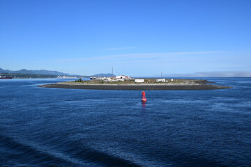 Coast Guard Station on Ediz Hook in Port Angeles Harbor, Washington on clear sunny summer morning.