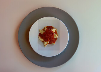 Culurgionis culurgiones, traditional Sardinian ravioli filled with potatoes, pecorino cheese and...
