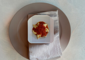 Culurgionis culurgiones, traditional Sardinian ravioli filled with potatoes, pecorino cheese and...