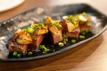 Tournedos Rossini recipe with foie gras on top of the steak. 