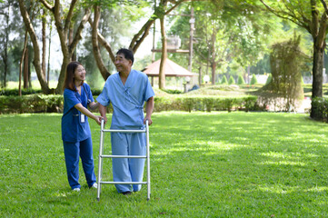 Fototapeta premium Asian Female Doctor Help Support Senior Patient and Provide Encouragement During Treatment. Rehabilitation or Physical Therapy of Asian Retired Patients with Walking Aids.