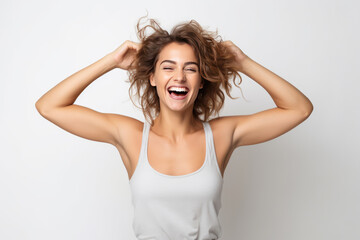 Fototapeta premium Happiness European Woman In Gray Tank Top On White Background
