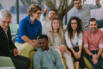Group of business colleagues sitting together