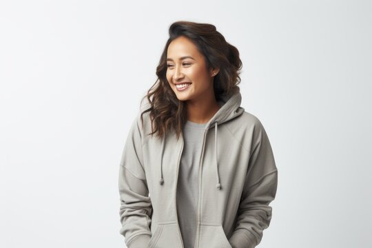 Portrait Of Happy Young Asian Woman In Hoodie Smiling Over White Background