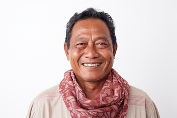 Obraz premium Portrait of a senior asian man smiling at the camera.
