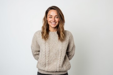 Obraz premium Group portrait of a Russian woman in her 30s in a white background wearing a cozy sweater