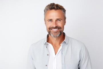 Medium shot portrait of a Russian man in his 40s in a white background wearing a chic cardigan
