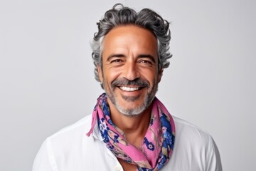 Obraz premium Medium shot portrait of a Brazilian man in his 40s in a white background wearing a foulard