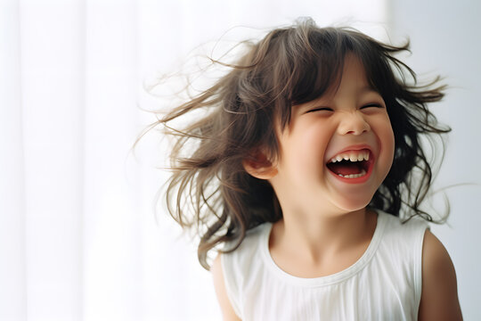 A joyful image of a child laughing and spreading happiness