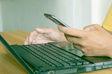 Men work from home using mobile phones, smartphones, and computers.