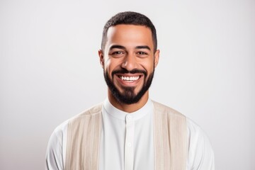Obraz premium Portrait of a handsome young african american man smiling over white background