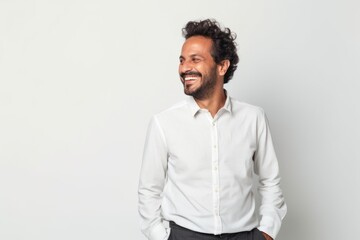Obraz premium Portrait of a handsome young man laughing. Isolated white background.