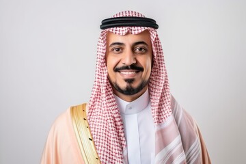 Portrait of a smiling arabian man over white background.