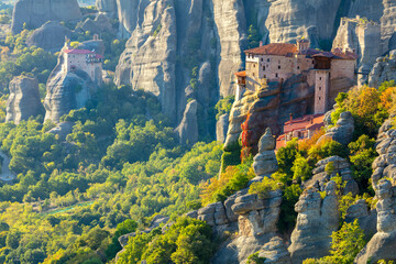 Meteora monasteries. Unique  Panoramic view on the Roussanou Monastery  placed on the edge  of high rock. The Meteora area is on UNESCO World Heritage. Greece