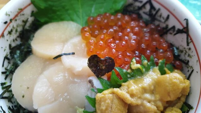 Hakodate famous fresh seafood over rice hotate ikura uni 3 kings raw scallop salmon roe sea urchin