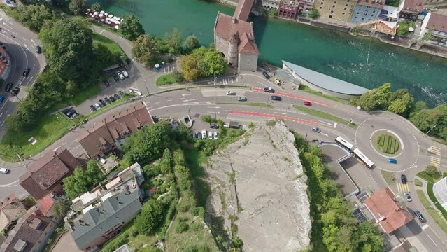 Aerial view of Swiss City of Baden with Limmat river and traffic on a sunny summer noon. Movie shot August 19th, 2023, Baden, Switzerland.