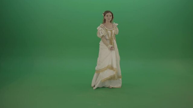 Cheerful girl dancing around the circle isolated on green screen