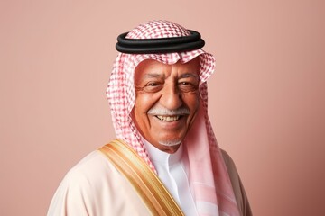 Portrait of a senior arabic man smiling at the camera