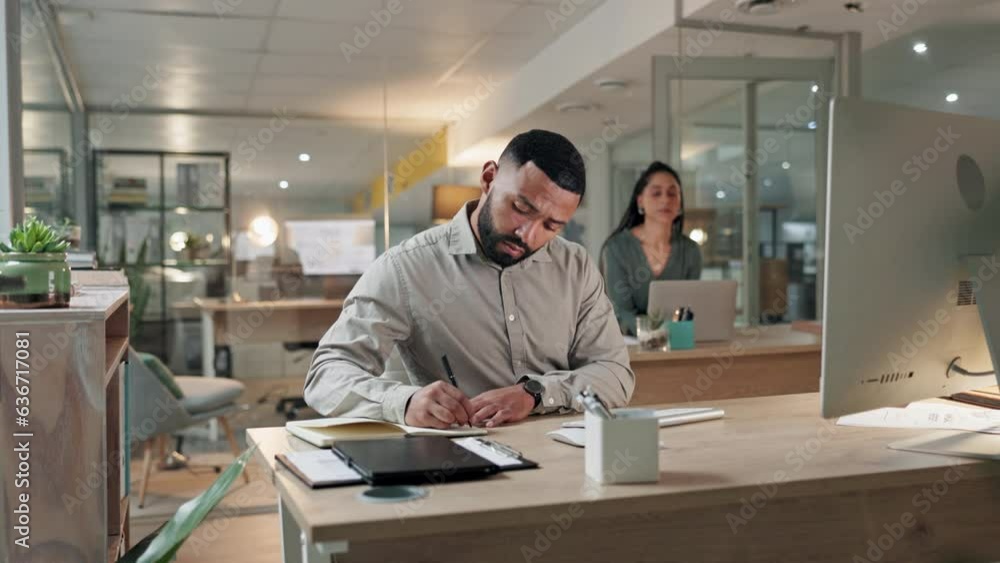 Poster computer, research and a business man writing in his notebook while planning in the office at night.
