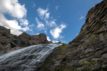 Beautiful photo with a mountain waterfall - 636720058
