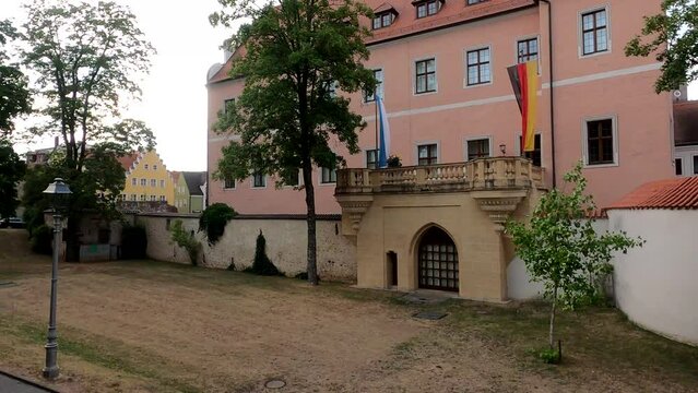 Exterior footage of traditional building with german flag in Ingolstadt, Germany