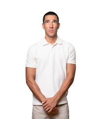 Fototapeta premium Serious young man looking against background