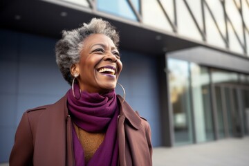 Portrait of a smiling african american woman in the city