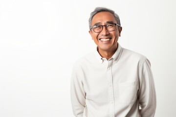 Fototapeta premium indian asian man with eyeglasses smiling on white background