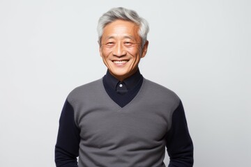 Portrait of happy asian senior man isolated on white background.