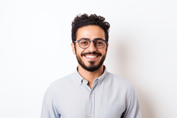 Obraz premium Portrait of a Saudi Arabian man in his 20s in a white background wearing a chic cardigan