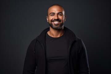 portrait of smiling african american man in black hoodie