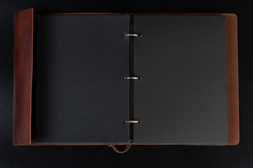 Open binder  with black pages