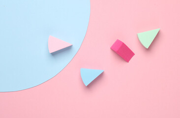 Make-up sponges, cosmetic beauty blenders on pink blue background. Top view. Flat lay