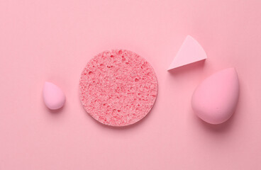 Obraz na płótnie Canvas Remover sponge and make-up blenders on a pink background. Beauty concept