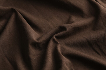 Wavy Brown fabric background. Cotton Texture