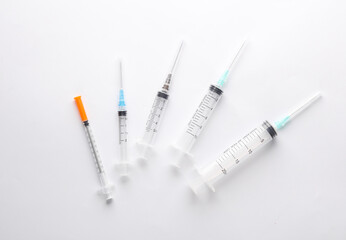 Set of syringes on a white background
